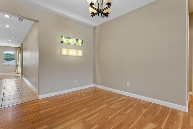 1892 Sanderling Dr, Clermont, FL 34711 - unfurnished room with a chandelier, light wood-type flooring, and recessed lighting
