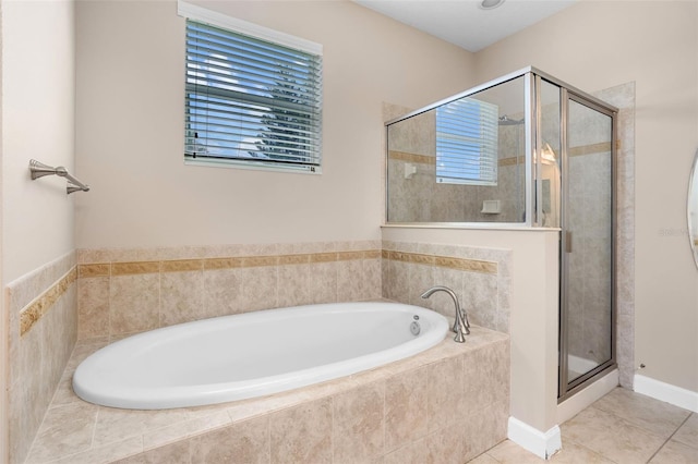 1892 Sanderling Dr, Clermont, FL 34711 - full bath with a bath, a stall shower, and tile patterned flooring