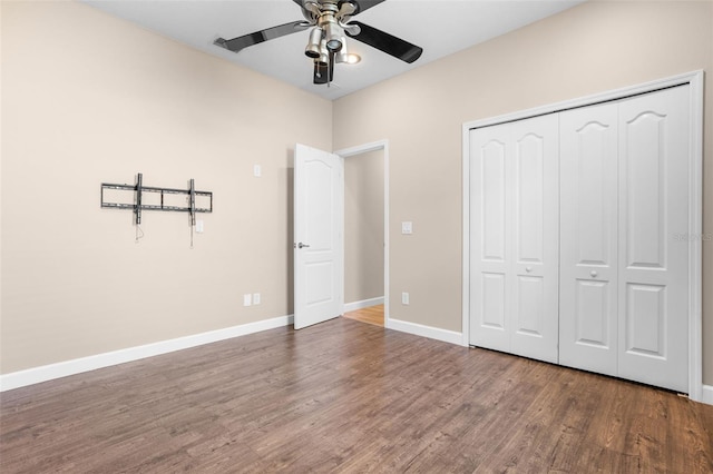 1892 Sanderling Dr, Clermont, FL 34711 - unfurnished bedroom with wood finished floors, a closet, and a ceiling fan