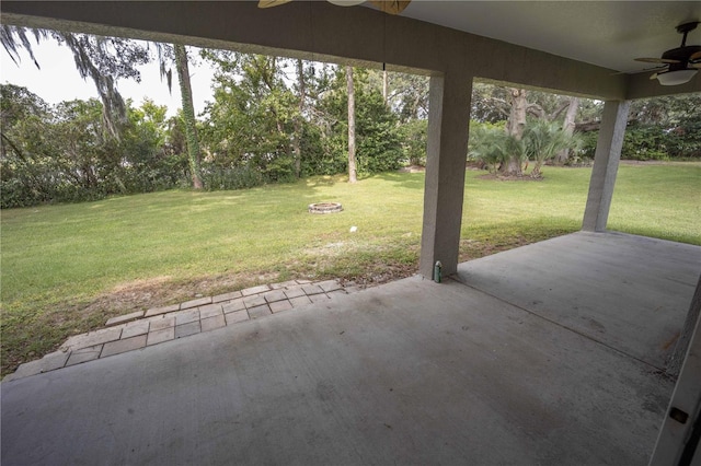 5005 County Road 125b1, Wildwood, FL 34785 - view of patio / terrace featuring a ceiling fan and view of scattered trees