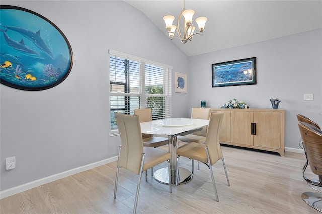5778 Henry Loop, The Villages, FL 32163 - dining area featuring lofted ceiling, light wood finished floors, and a chandelier