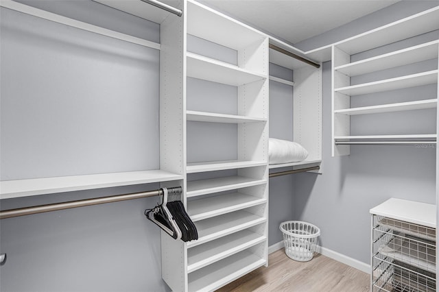 5778 Henry Loop, The Villages, FL 32163 - spacious closet featuring wood finished floors