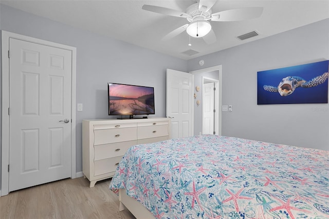 5778 Henry Loop, The Villages, FL 32163 - bedroom featuring light wood finished floors and a ceiling fan