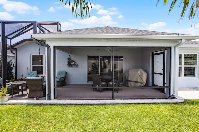 5778 Henry Loop, The Villages, FL 32163 - back of house with a yard, roof with shingles, stucco siding, and ceiling fan