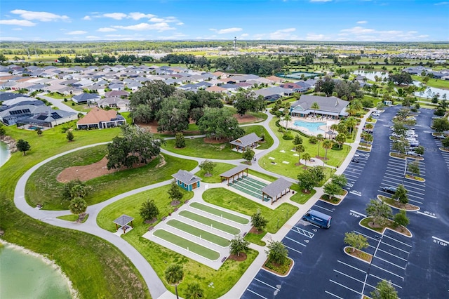 5778 Henry Loop, The Villages, FL 32163 - aerial view of property and surrounding area with a large body of water and nearby suburban area
