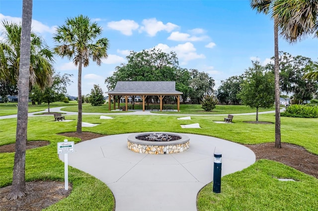 5778 Henry Loop, The Villages, FL 32163 - view of property's community featuring a gazebo, a yard, and a fire pit