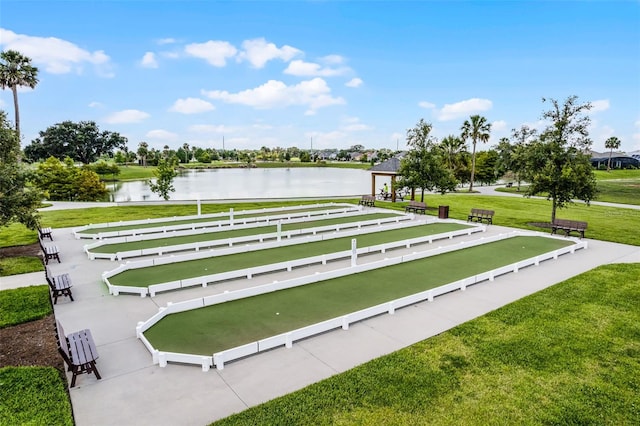 5778 Henry Loop, The Villages, FL 32163 - view of home's community featuring a bocce ball area, a water view, and a yard