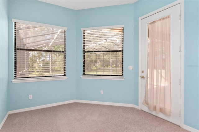 21312 Marsh View Ct, Clermont, FL 34715 - empty room with carpet floors and plenty of natural light