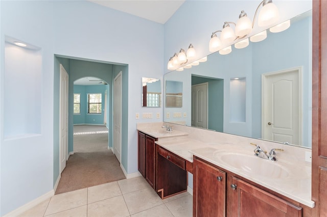 21312 Marsh View Ct, Clermont, FL 34715 - bathroom with double vanity and tile patterned floors