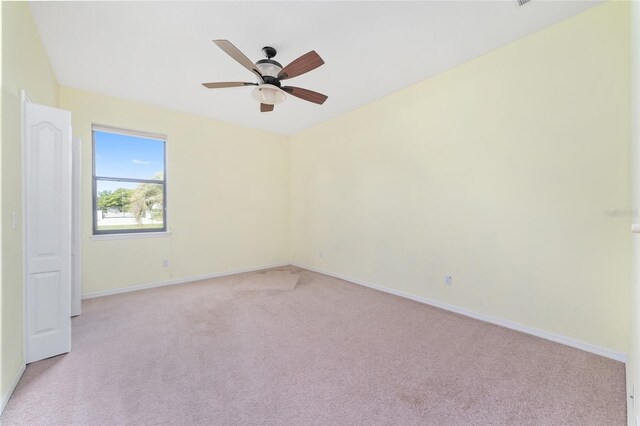 21312 Marsh View Ct, Clermont, FL 34715 - empty room featuring light carpet and ceiling fan