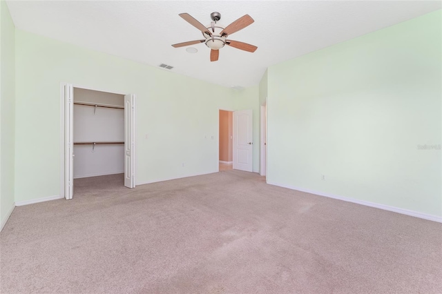 21312 Marsh View Ct, Clermont, FL 34715 - unfurnished bedroom featuring light colored carpet, a ceiling fan, and a closet