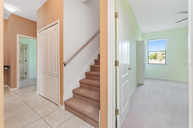 21312 Marsh View Ct, Clermont, FL 34715 - stairway with baseboards and tile patterned floors