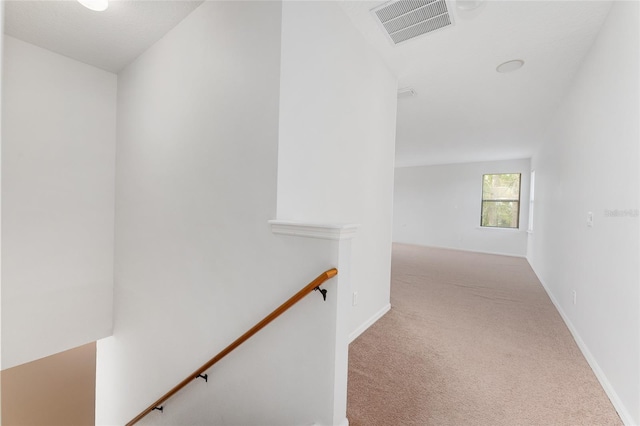 21312 Marsh View Ct, Clermont, FL 34715 - hallway with an upstairs landing and carpet