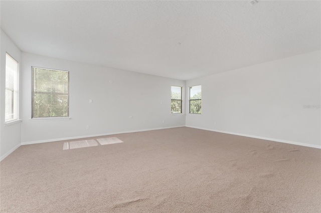 21312 Marsh View Ct, Clermont, FL 34715 - carpeted spare room with baseboards