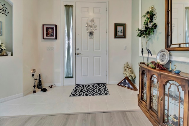 3507 Arlington Ridge Blvd, Leesburg, FL 34748 - tiled entryway with baseboards