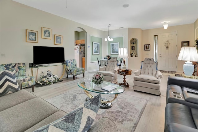 3507 Arlington Ridge Blvd, Leesburg, FL 34748 - living room with wood finished floors and arched walkways