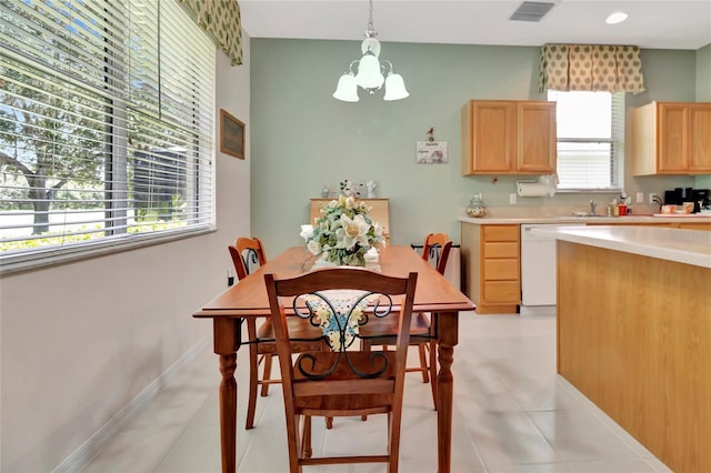 3507 Arlington Ridge Blvd, Leesburg, FL 34748 - dining area featuring a chandelier and light tile patterned floors