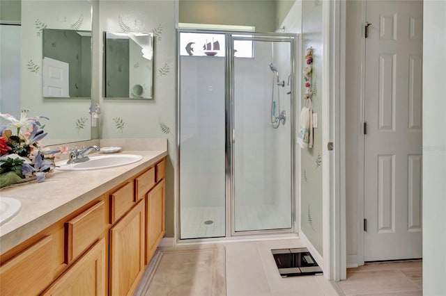 3507 Arlington Ridge Blvd, Leesburg, FL 34748 - full bathroom featuring a shower stall, double vanity, and tile patterned flooring