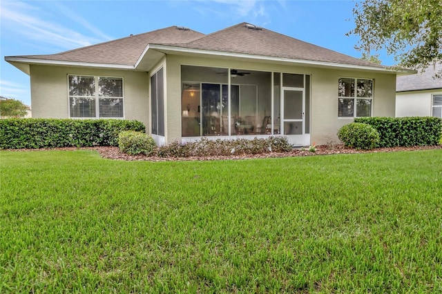 3507 Arlington Ridge Blvd, Leesburg, FL 34748 - rear view of property featuring a sunroom, a lawn, and stucco siding