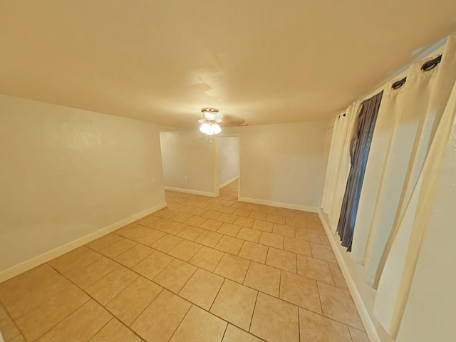 1610 Williams Ave, Eustis, FL 32726 - unfurnished room featuring light tile patterned flooring and baseboards
