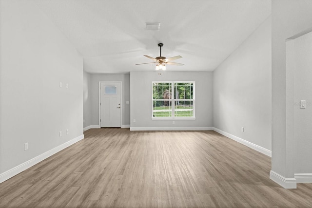 8641 N Stern Way, Citrus Springs, FL 34434 - unfurnished living room featuring ceiling fan and wood finished floors
