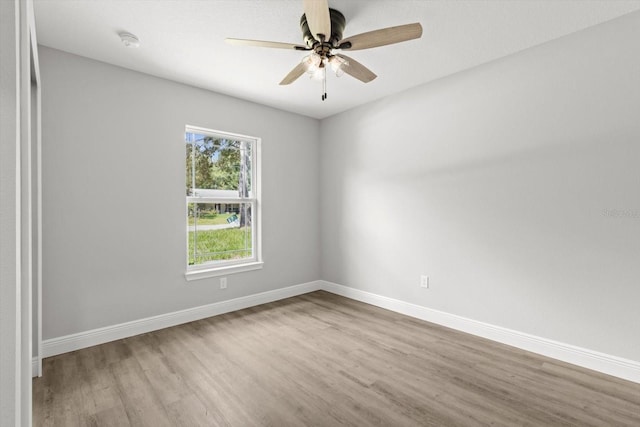 8641 N Stern Way, Citrus Springs, FL 34434 - spare room with a smoke detector, wood finished floors, and ceiling fan