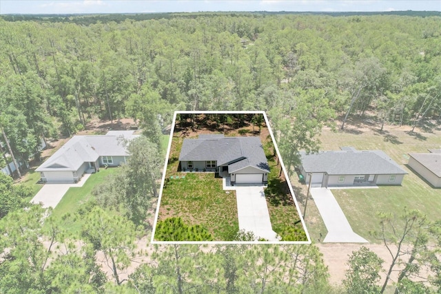 8641 N Stern Way, Citrus Springs, FL 34434 - aerial overview of property's location with a heavily wooded area and property boundaries highlighted
