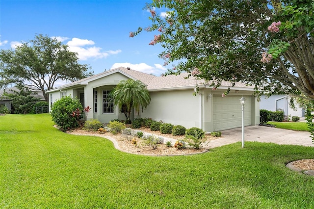 5971 Brittania Blvd, Tavares, FL 32778 - view of front facade with stucco siding, concrete driveway, a front yard, and a garage