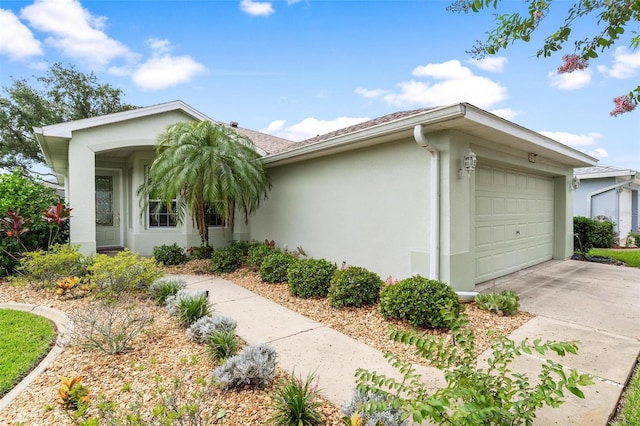 5971 Brittania Blvd, Tavares, FL 32778 - single story home with an attached garage, stucco siding, and concrete driveway