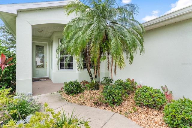 5971 Brittania Blvd, Tavares, FL 32778 - property entrance featuring stucco siding