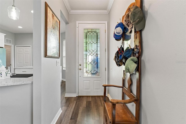 5971 Brittania Blvd, Tavares, FL 32778 - entrance foyer with dark wood-style floors, ornamental molding, and recessed lighting
