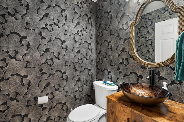 5971 Brittania Blvd, Tavares, FL 32778 - half bathroom with wallpapered walls and vanity