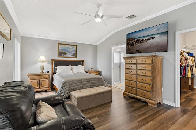 5971 Brittania Blvd, Tavares, FL 32778 - bedroom featuring lofted ceiling, wood finished floors, ornamental molding, a spacious closet, and a closet