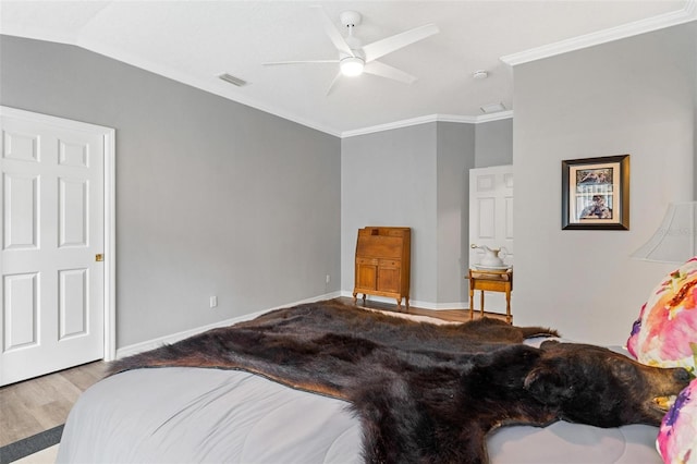 5971 Brittania Blvd, Tavares, FL 32778 - bedroom featuring crown molding, ceiling fan, and wood finished floors