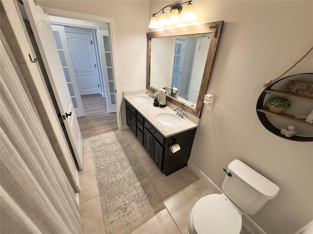 384 Summer Squall Rd, Davenport, FL 33837 - full bath featuring double vanity and tile patterned flooring