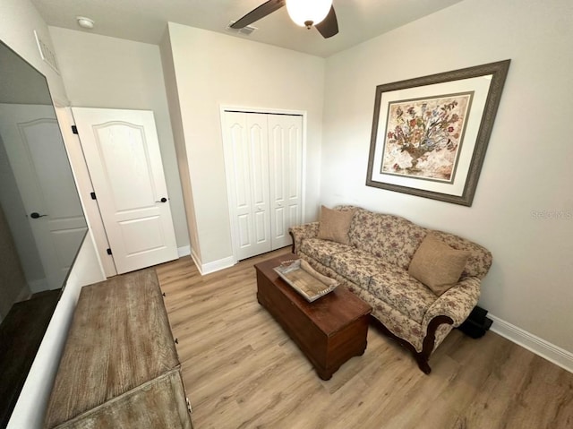 384 Summer Squall Rd, Davenport, FL 33837 - living area with light wood-type flooring and ceiling fan