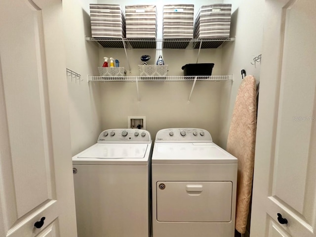 384 Summer Squall Rd, Davenport, FL 33837 - washroom featuring washing machine and clothes dryer