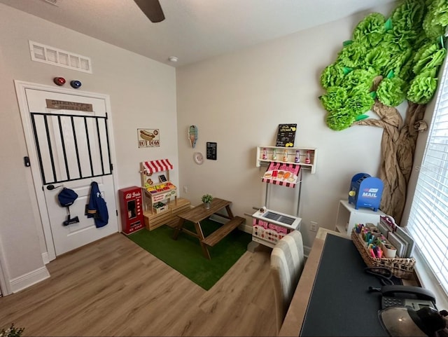 384 Summer Squall Rd, Davenport, FL 33837 - recreation room featuring wood finished floors and a ceiling fan