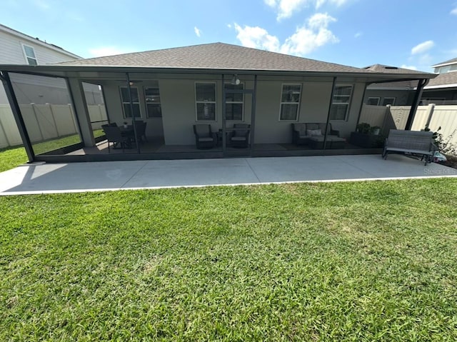 384 Summer Squall Rd, Davenport, FL 33837 - back of house with a patio and roof with shingles