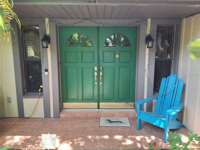 29205 Old Ml E, Tavares, FL 32778 - entrance to property featuring a porch and stucco siding