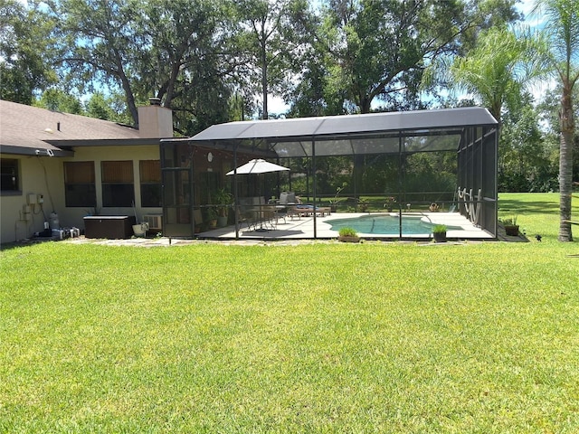 29205 Old Ml E, Tavares, FL 32778 - view of green lawn featuring an outdoor pool, a patio, and glass enclosure