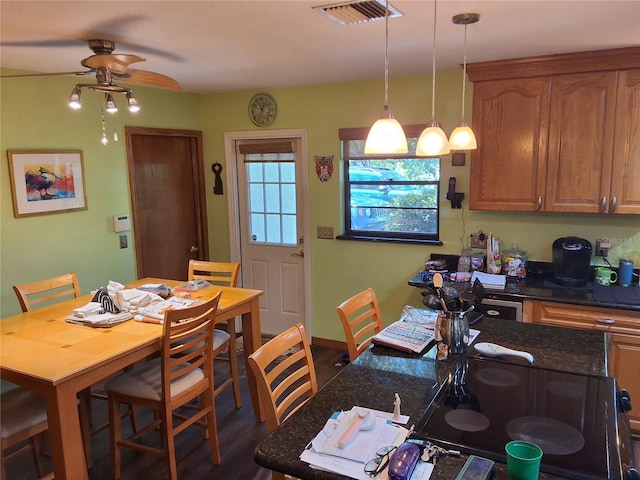 29205 Old Ml E, Tavares, FL 32778 - dining space with a ceiling fan and dark wood finished floors
