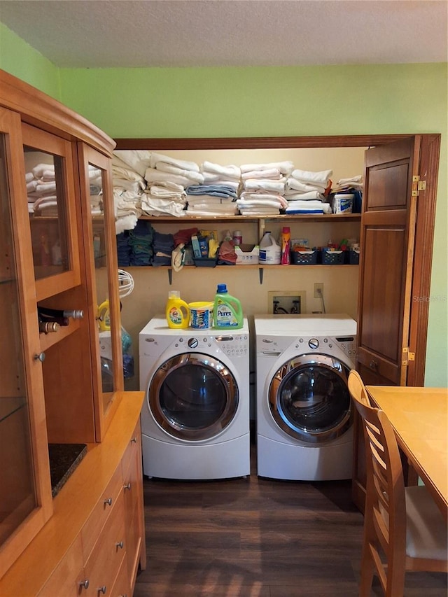 29205 Old Ml E, Tavares, FL 32778 - washroom with washer and clothes dryer and dark wood-style flooring