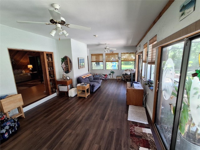 29205 Old Ml E, Tavares, FL 32778 - living room featuring healthy amount of natural light, dark wood-type flooring, and a ceiling fan