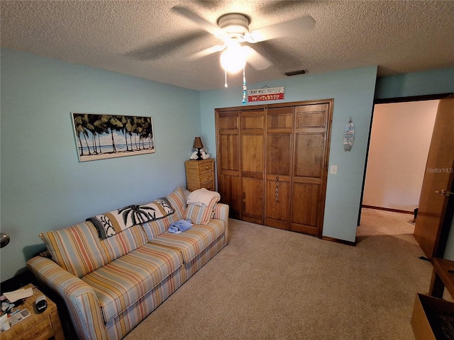 29205 Old Ml E, Tavares, FL 32778 - living room with ceiling fan, a textured ceiling, and carpet flooring