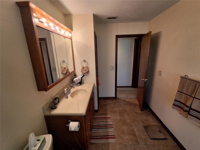 29205 Old Ml E, Tavares, FL 32778 - bathroom with vanity and baseboards