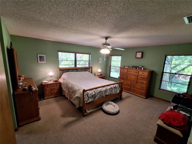 29205 Old Ml E, Tavares, FL 32778 - carpeted bedroom featuring a textured ceiling and ceiling fan