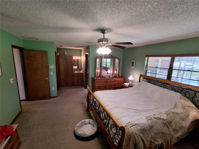 29205 Old Ml E, Tavares, FL 32778 - bedroom featuring multiple windows, light carpet, a textured ceiling, ceiling fan, and ensuite bathroom