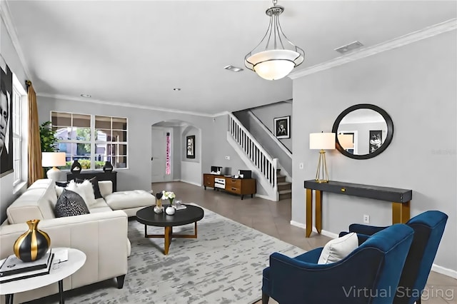 15604 Starlite St, Clermont, FL 34714 - living area with arched walkways, ornamental molding, and stairway