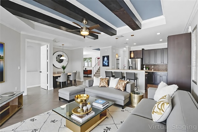 15604 Starlite St, Clermont, FL 34714 - living room with recessed lighting, ceiling fan, a raised ceiling, stairs, and light tile patterned floors